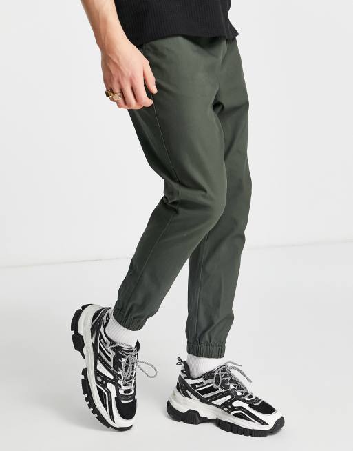 ASOS DESIGN tapered chino trackies with elasticated waist in dark green