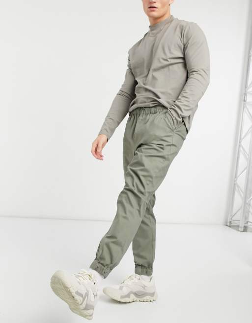ASOS DESIGN tapered chino trackies with elasticated waist in khaki