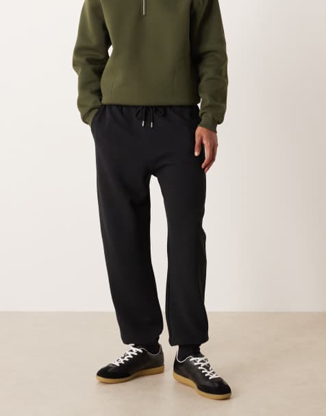 ASOS DESIGN tapered co-ord ribbed joggers in black - view 1