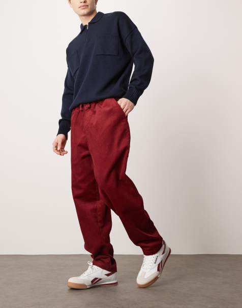 ASOS DESIGN tapered cord pants in burgundy - view 1