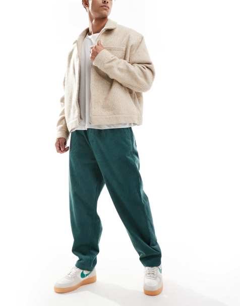 ASOS DESIGN tapered cord trousers in green - view 1