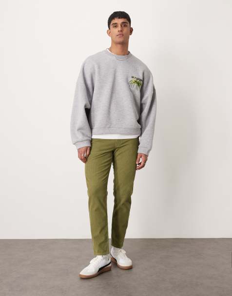 ASOS DESIGN tapered cord trousers in khaki - view 1