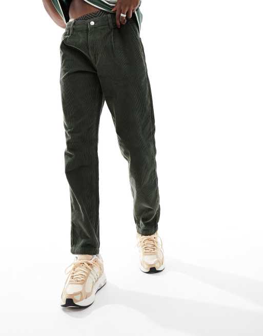 ASOS DESIGN relaxed tapered corduroy jeans in dark green