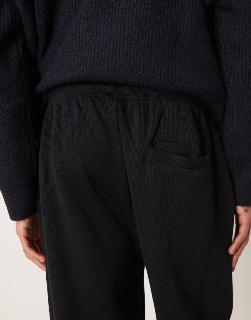 ASOS DESIGN tapered cuffed jogger in black, 4 of 5