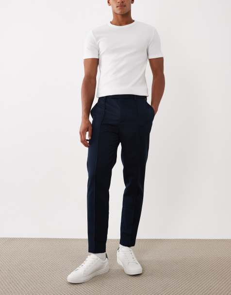 ASOS DESIGN tapered dress pants with pintuck front in navy - view 1