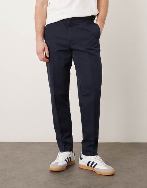 ASOS DESIGN tapered dress pants with side adjusters in navy - view 1