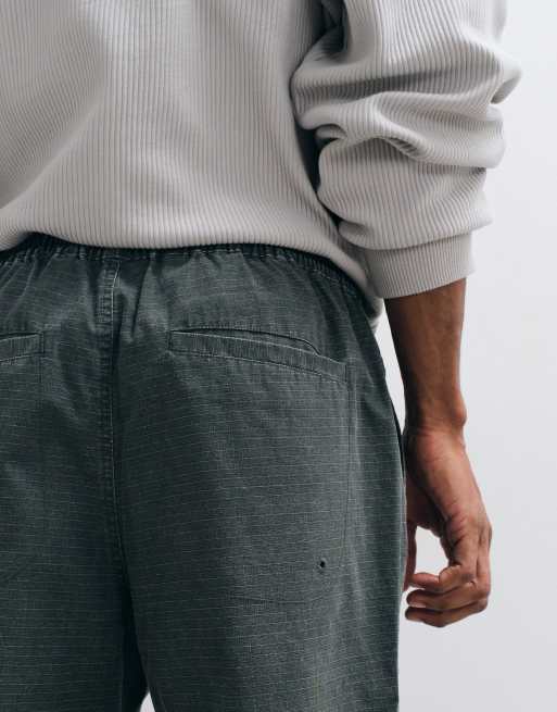ASOS DESIGN tapered elasticated trousers with drawcord in charcoal ripstop, 5 of 5