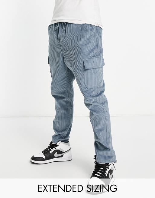 ASOS DESIGN tapered fit cargo pants in cord in blue ASOS
