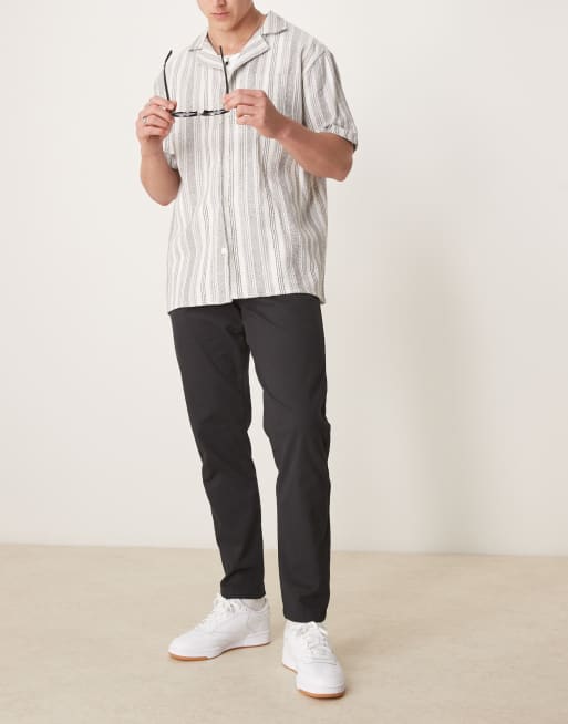ASOS DESIGN tapered fit chinos  in black