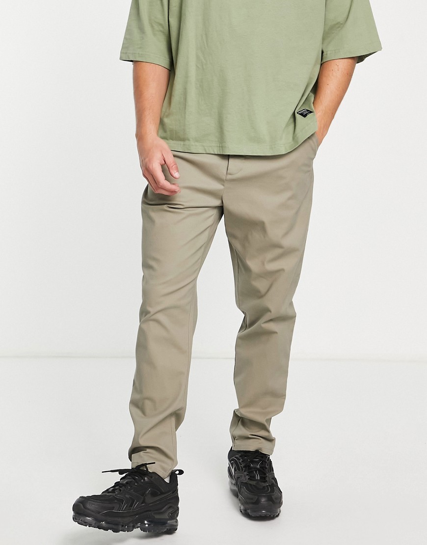 ASOS DESIGN tapered fit chinos in khaki-Green