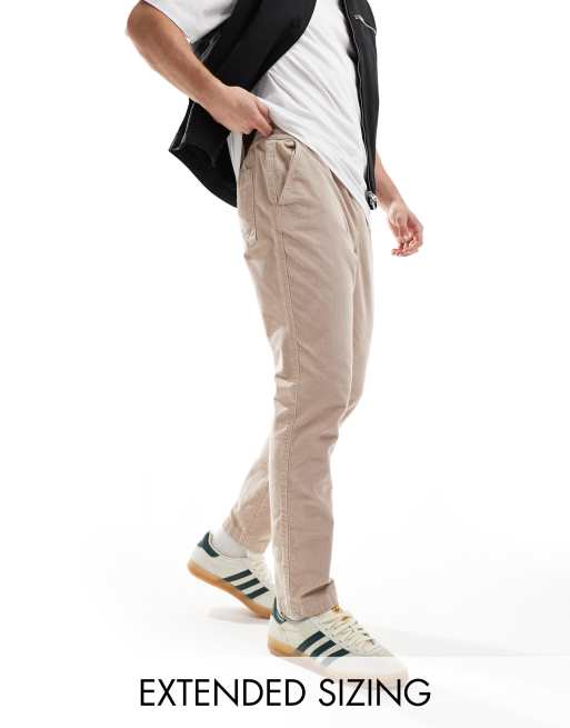 ASOS DESIGN tapered fit cord pants with elastic waist in taupe 