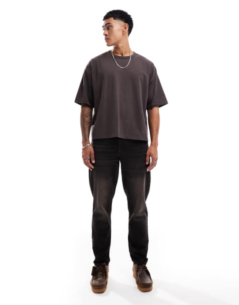 ASOS DESIGN tapered fit in washed black with brown tint - view 1