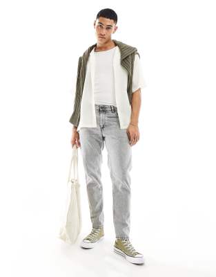 ASOS DESIGN ASOS DESIGN tapered fit jeans in acid wash - GREY