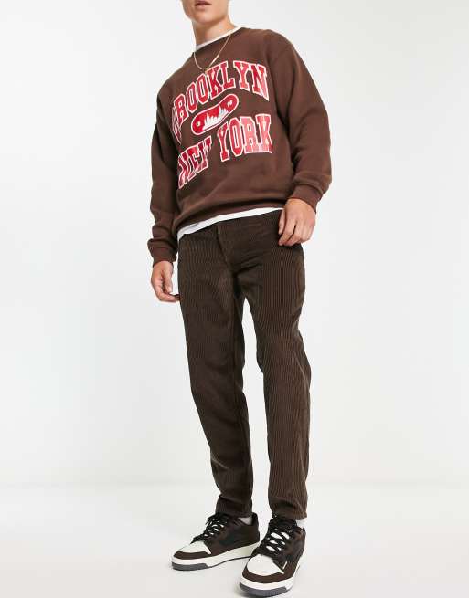 ASOS DESIGN tapered fit jeans in brown corduroy - BROWN