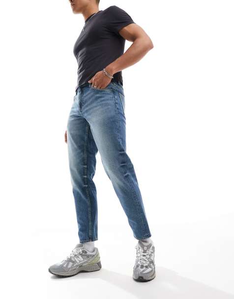 ASOS DESIGN tapered fit jeans in dark wash blue - MBLUE - view 1