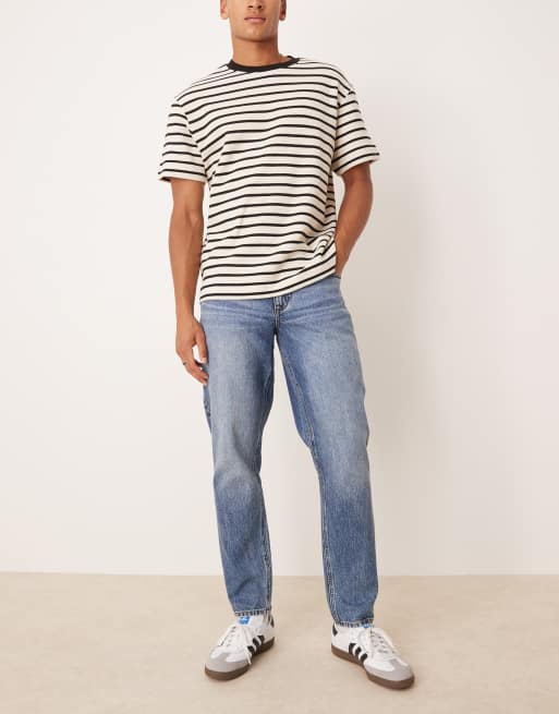 ASOS DESIGN tapered fit jeans in dark wash blue