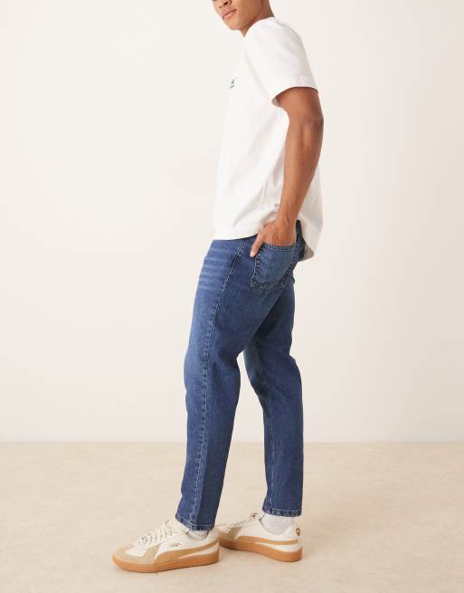 ASOS DESIGN tapered fit jeans in dark wash blue, 3 of 5