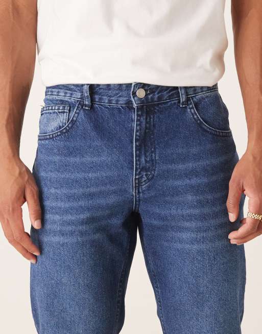 ASOS DESIGN tapered fit jeans in dark wash blue, 5 of 5