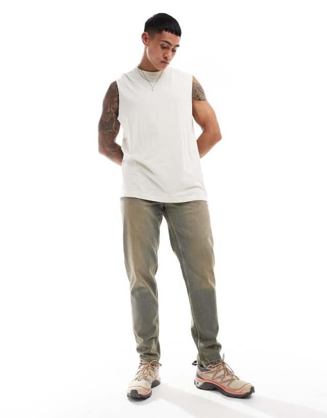 ASOS DESIGN - tapered fit jeans in heavy tint - mblue