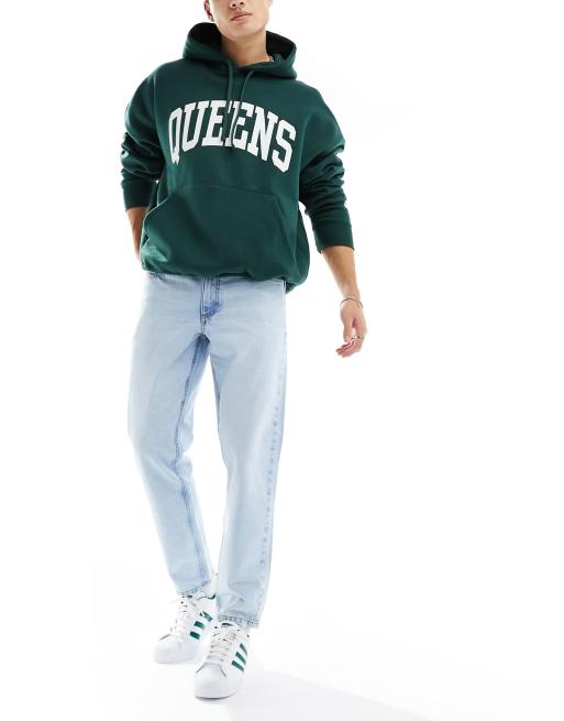 ASOS DESIGN tapered fit jeans in light blue
