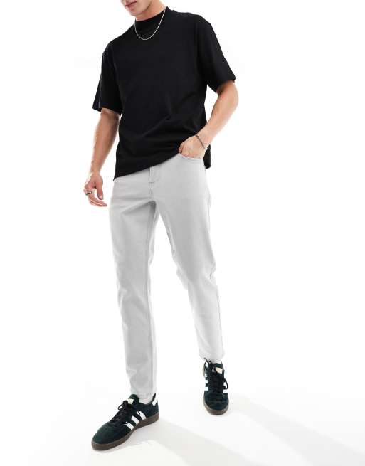 ASOS DESIGN tapered fit jeans in light grey wash