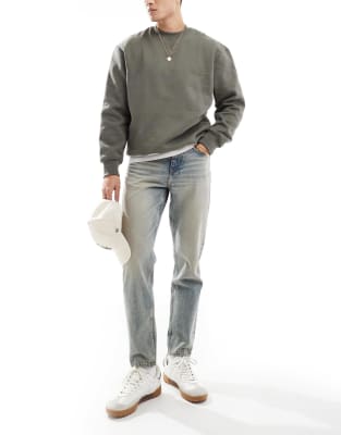 Asos Design Tapered Fit Jeans In Light Wash Blue