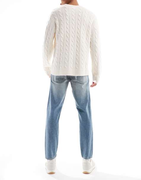 ASOS DESIGN tapered fit jeans in light wash blue - view 1