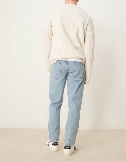 ASOS DESIGN tapered fit jeans in mid wash blue  , 3 of 5