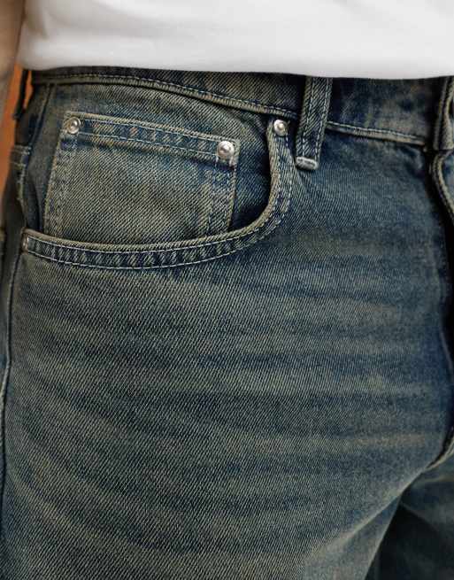 ASOS DESIGN tapered fit jeans in mid wash blue