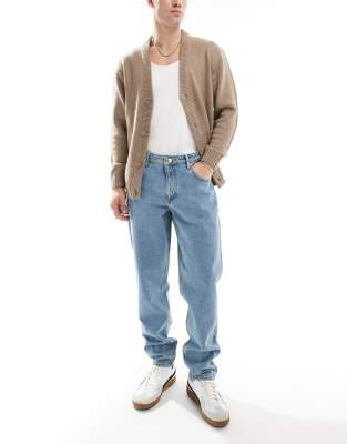 Asos Design Tapered Fit Jeans In Light Wash Blue In Blue