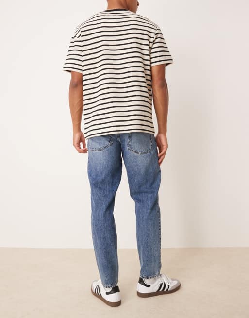ASOS DESIGN tapered fit jeans in mid wash blue, 2 of 5