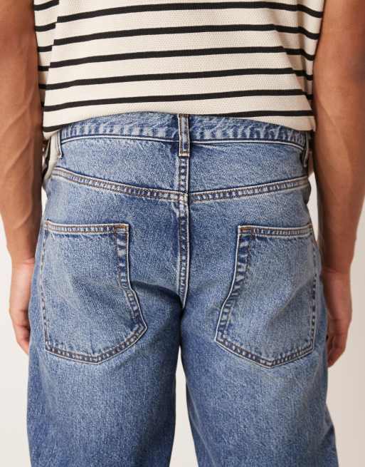 ASOS DESIGN tapered fit jeans in mid wash blue, 5 of 5