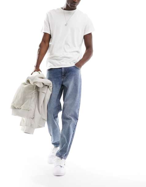 ASOS DESIGN tapered fit jeans in noughties blue wash  - view 1