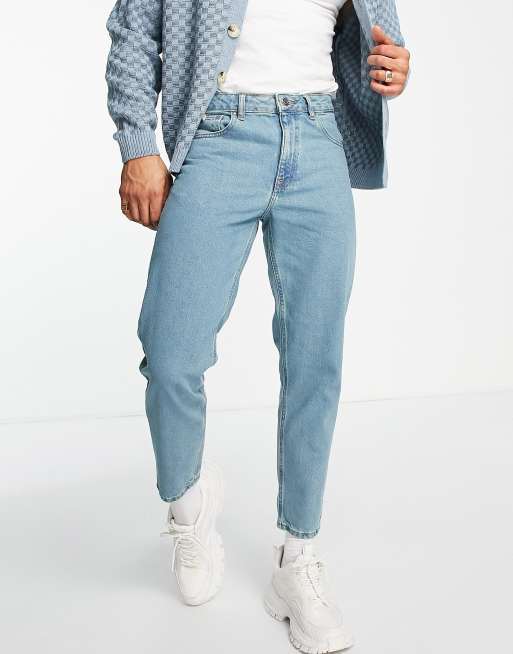 ASOS DESIGN tapered fit jeans in tinted light wash blue , 4 of 4