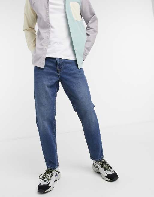 ASOS DESIGN tapered fit jeans in vintage dark wash blue - MBLUE