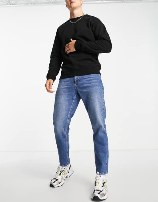 ASOS DESIGN tapered fit jeans in vintage mid wash blue containing hemp - MBLUE
