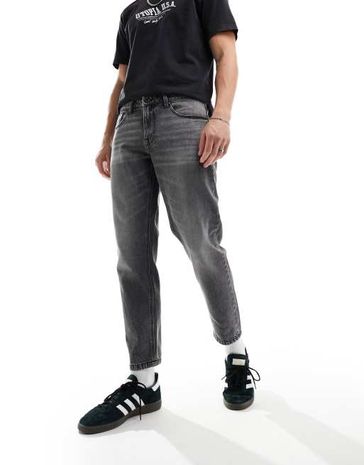 ASOS DESIGN tapered fit jeans in washed black