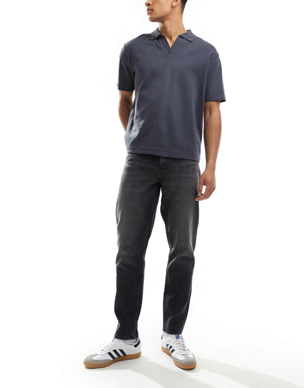 ASOS DESIGN tapered fit jeans in washed black