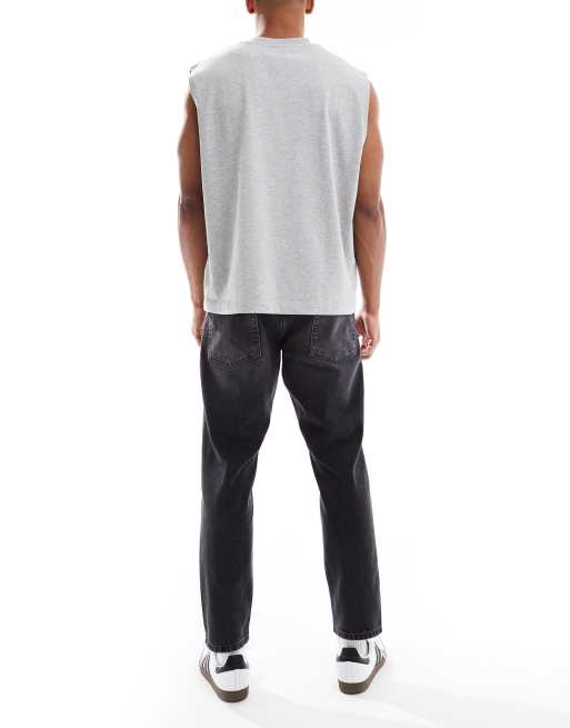 ASOS DESIGN tapered fit jeans in washed black, 2 of 5