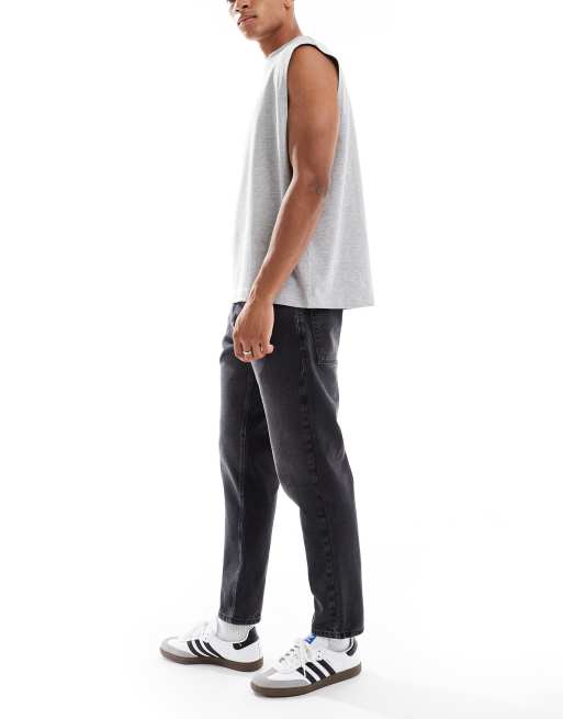 ASOS DESIGN tapered fit jeans in washed black, 3 of 5