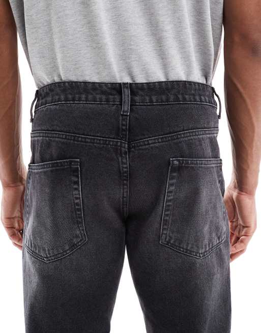 ASOS DESIGN tapered fit jeans in washed black, 5 of 5