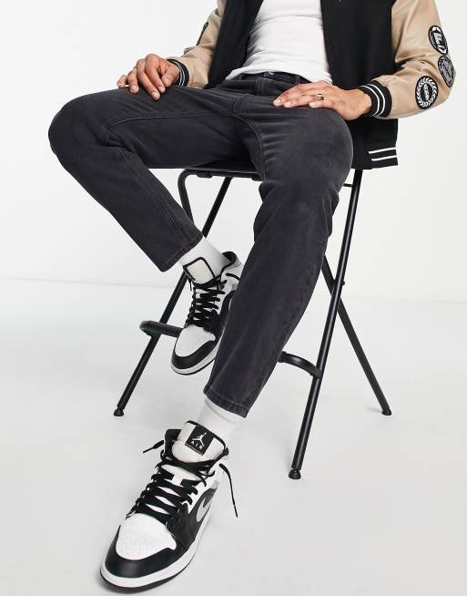ASOS DESIGN tapered fit jeans in washed black , 3 of 4