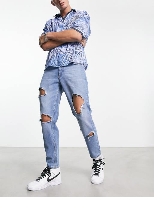 ASOS DESIGN tapered fit jeans with heavy knees in mid wash blue  - MBLUE
