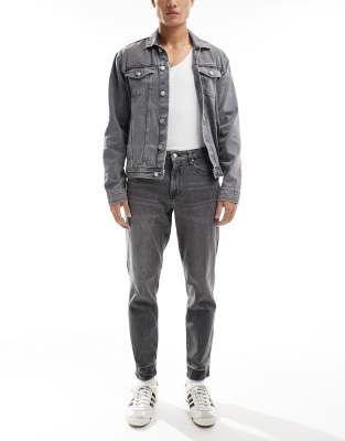 ASOS DESIGN tapered fit jeans with stretch in washed grey