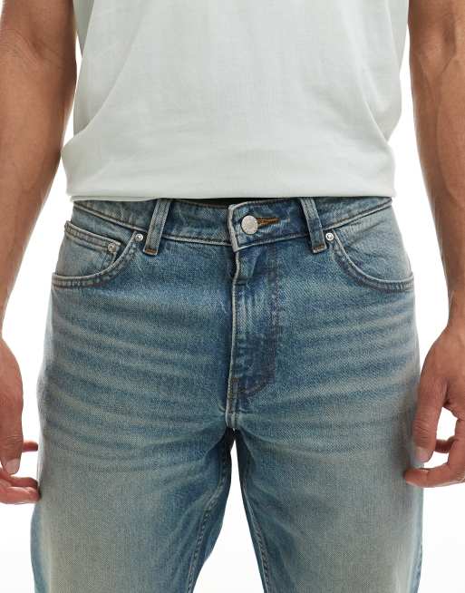 ASOS DESIGN tapered fit jeans with tint in light wash blue, 5 of 5