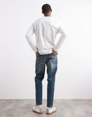 Asos Design Tapered Fit Jeans With Tint In Blue