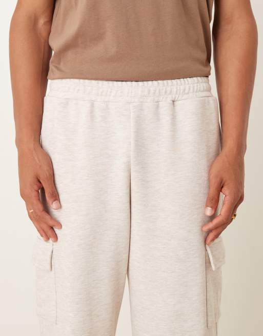 ASOS DESIGN tapered fit loopback jogger with cargo pockets in stone, 4 of 5