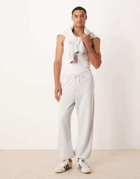 ASOS DESIGN tapered fit loopback sweatpants in heather gray - view 1