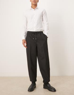 Asos Design Tapered Fit Pants With Elasticized Waist And Cuffs In Black
