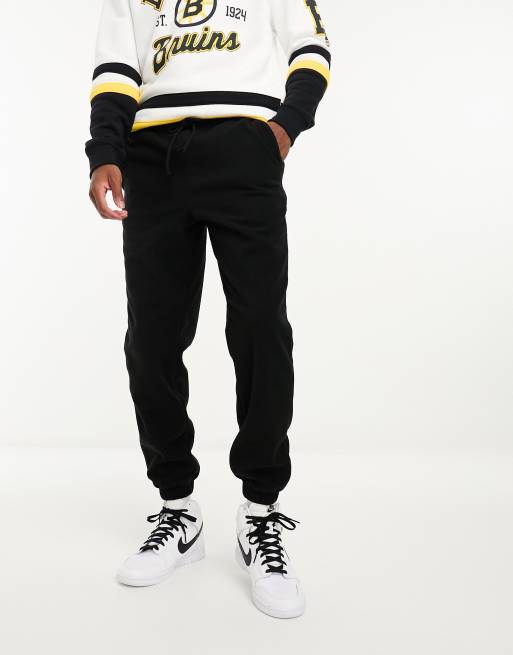 ASOS DESIGN tapered fleece joggers in black ASOS